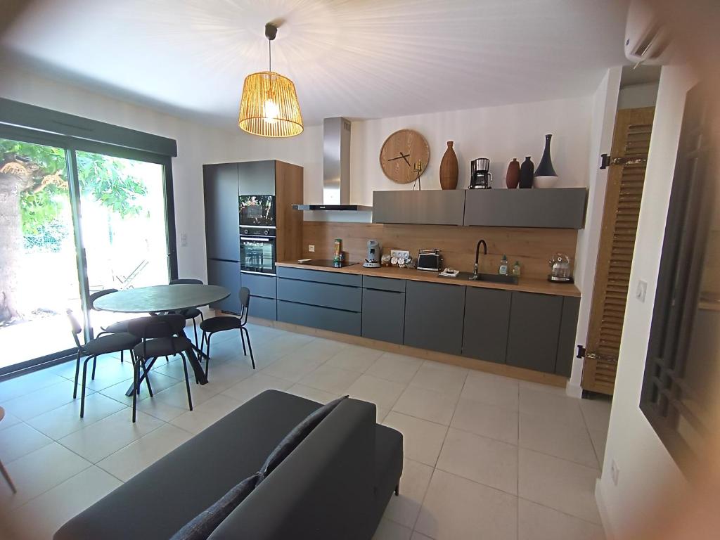 Kuchyň nebo kuchyňský kout v ubytování havre de paix au bord de mer - Casa Marina