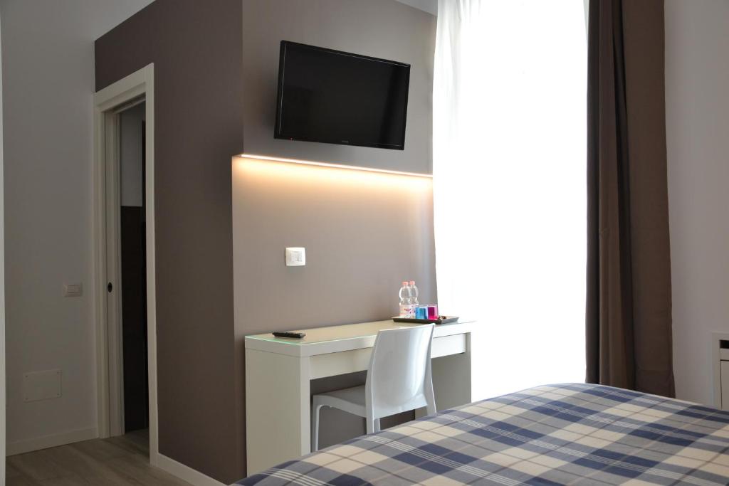 Postel nebo postele na pokoji v ubytování In Centro Glam