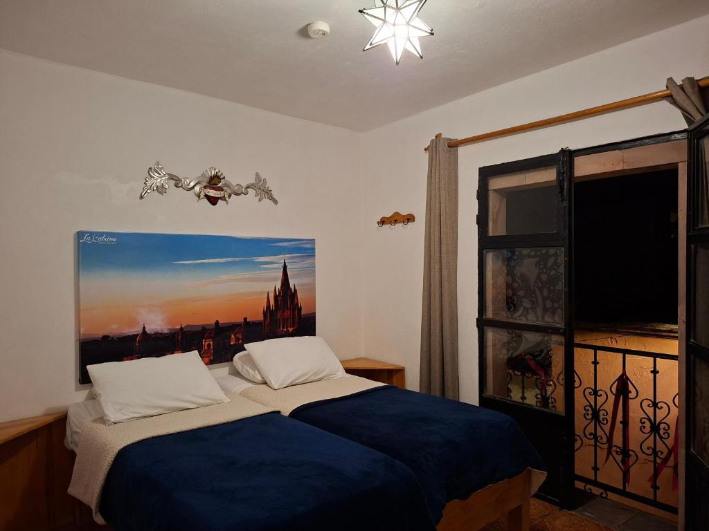 Postel nebo postele na pokoji v ubytování La Catrina Hostel