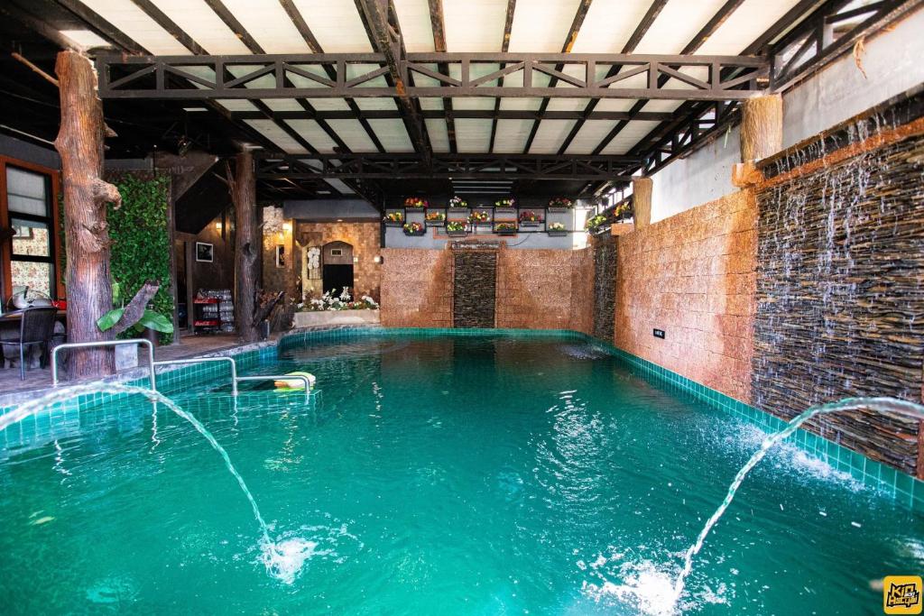 Bazén v ubytování Nice Villa Resort Hat Yai nebo v jeho okolí