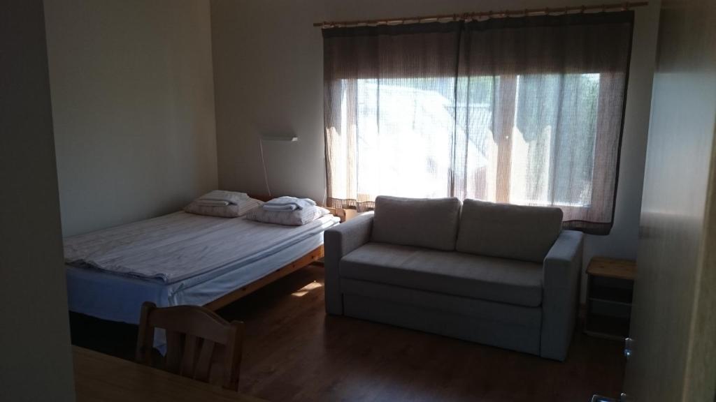 Postel nebo postele na pokoji v ubytování Aisa Accommodation
