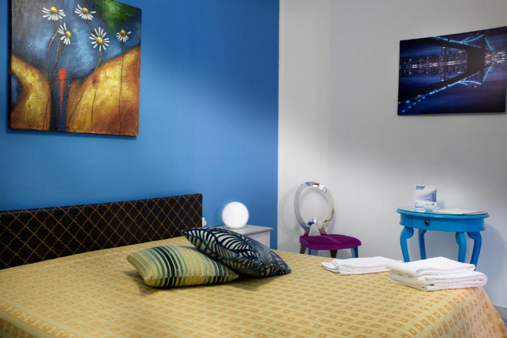 Postel nebo postele na pokoji v ubytování B&B Il Mandorlo