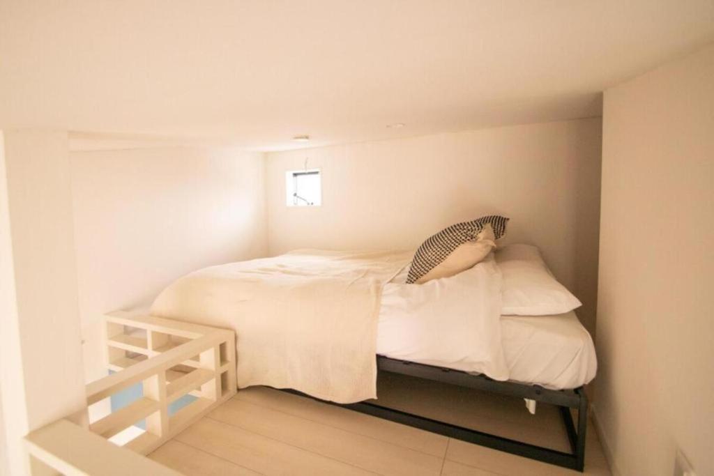 Postel nebo postele na pokoji v ubytování SCS202, 20 mins to Skytree, 30 mins to Ueno and Ginza