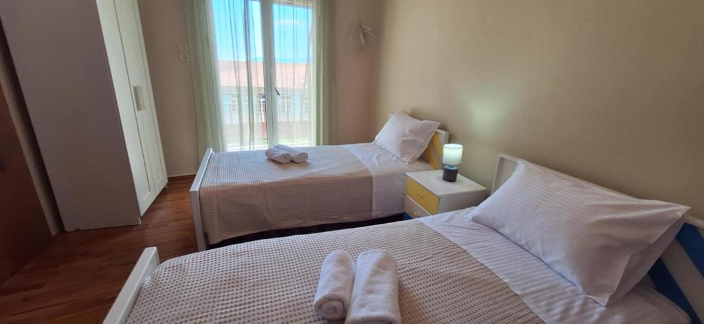 Ένα ή περισσότερα κρεβάτια σε δωμάτιο στο levanta