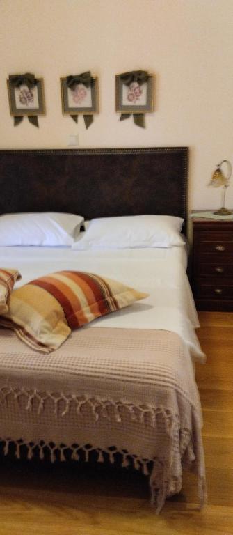 Postel nebo postele na pokoji v ubytování Valentini Guesthouse