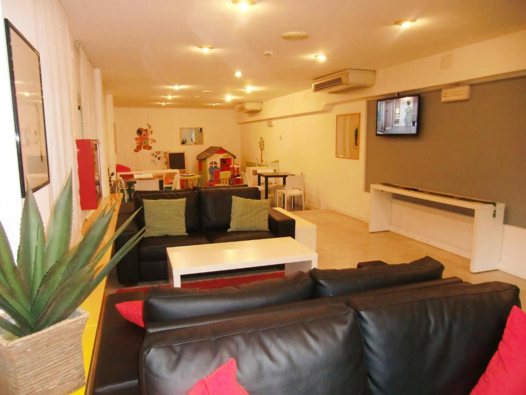 TV a/nebo společenská místnost v ubytování Hotel Desire'