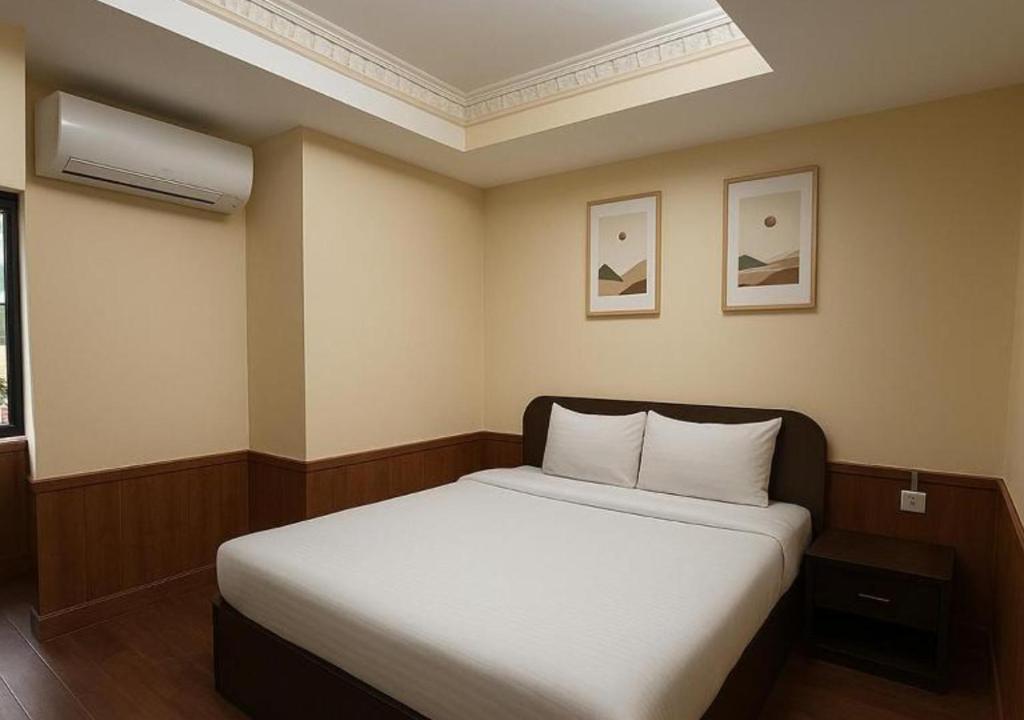 Letto o letti in una camera di Boudha Mandala Hotel