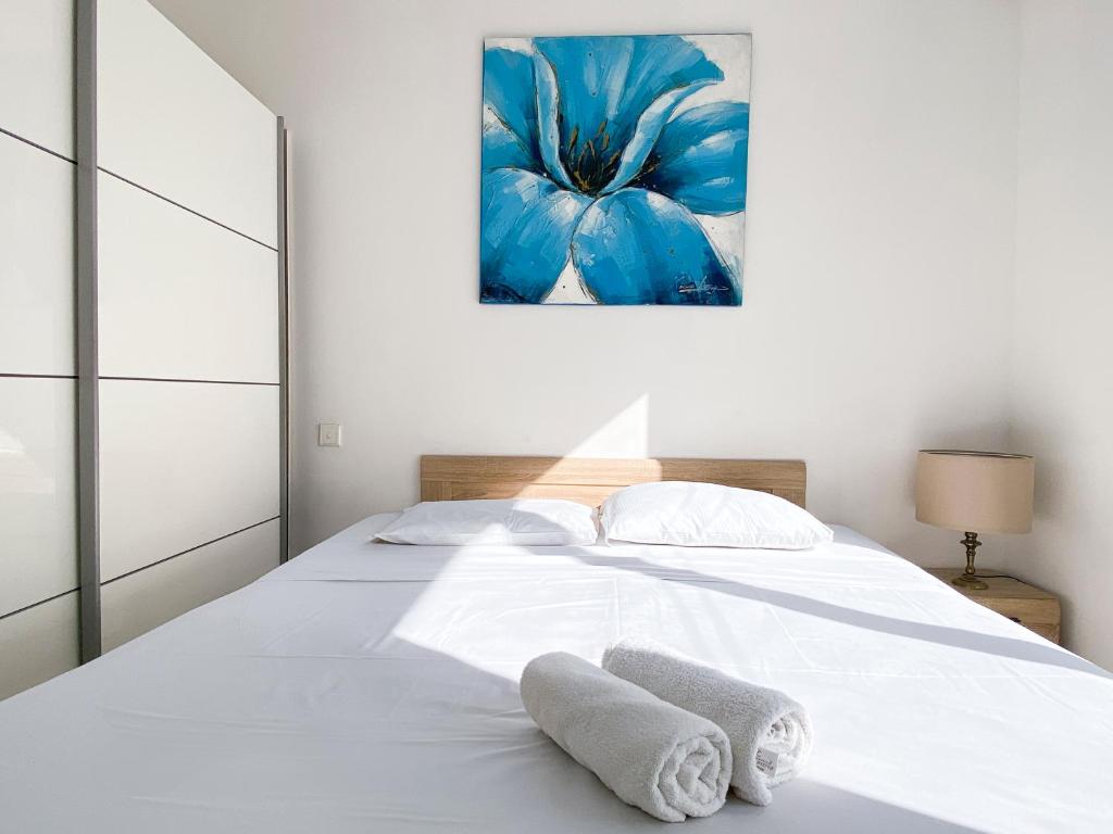 Ένα ή περισσότερα κρεβάτια σε δωμάτιο στο Central Paceville Apartment