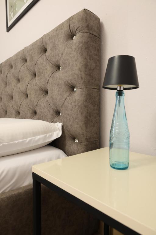 A bed or beds in a room at Central Hostel