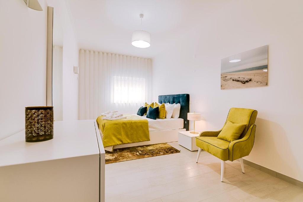 Uma área de estar em Apartamentos Sol & Ria