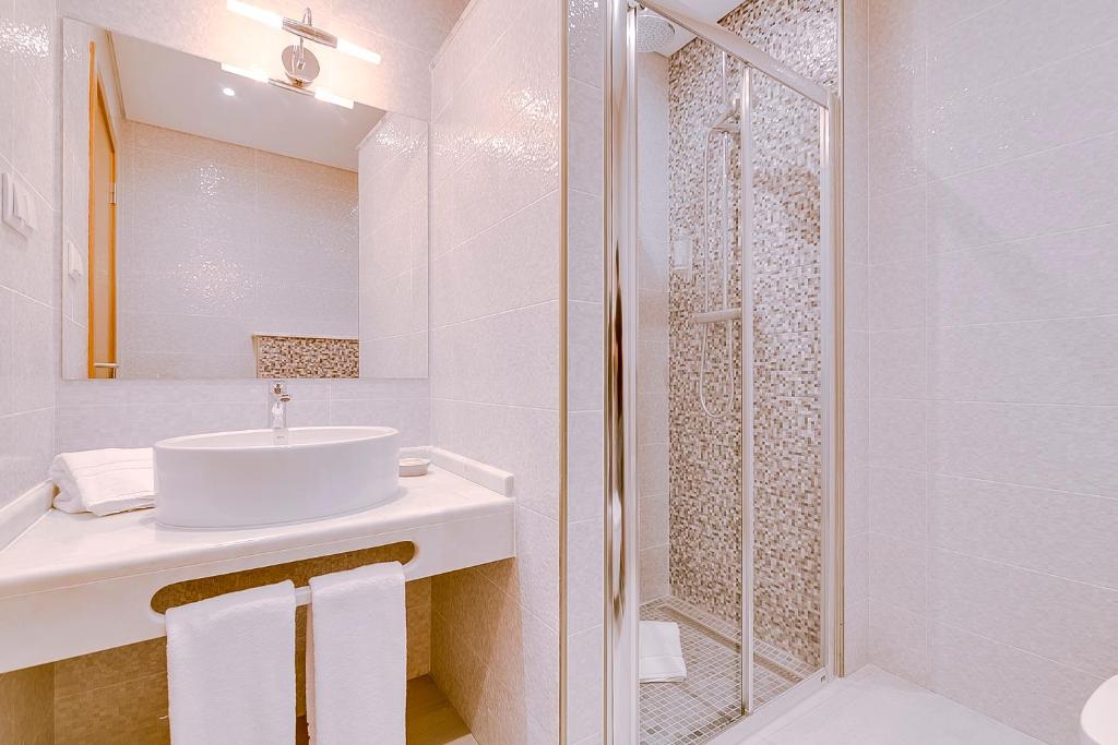 Um banheiro em Apartamentos Sol & Ria