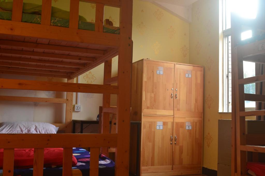 Postel nebo postele na pokoji v ubytování Notting Hill Hostel