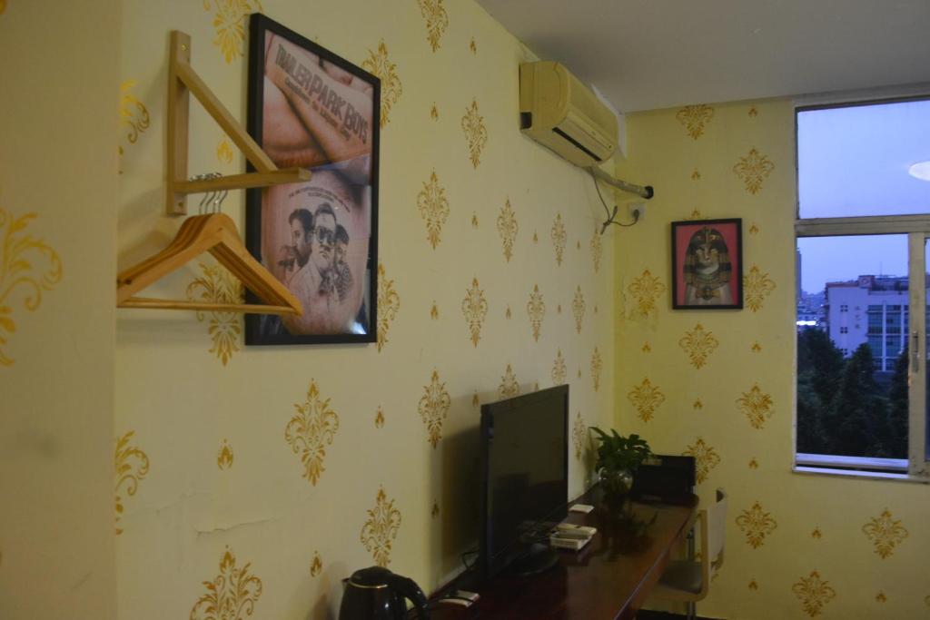 TV a/nebo společenská místnost v ubytování Notting Hill Hostel
