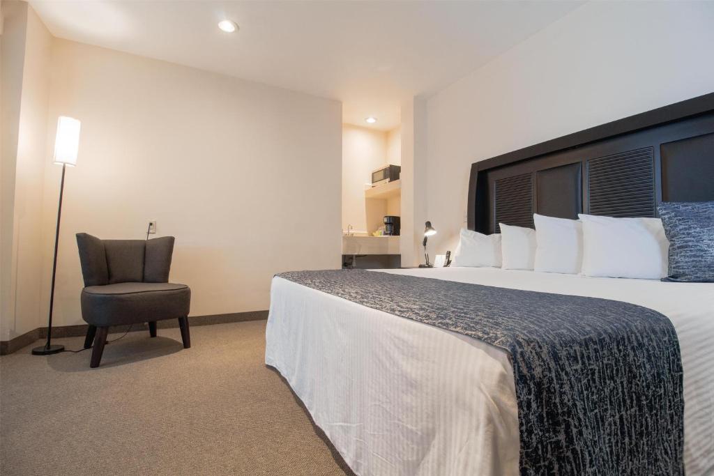 Postel nebo postele na pokoji v ubytování Best Western Real Tula Express