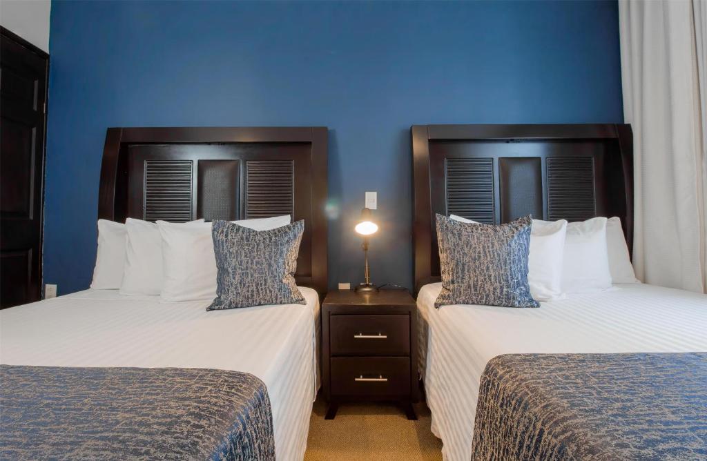 Postel nebo postele na pokoji v ubytování Best Western Real Tula Express