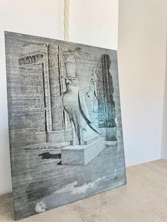 a picture of a statue in front of a building at Bulldog Venice Apartment in Venice-Lido