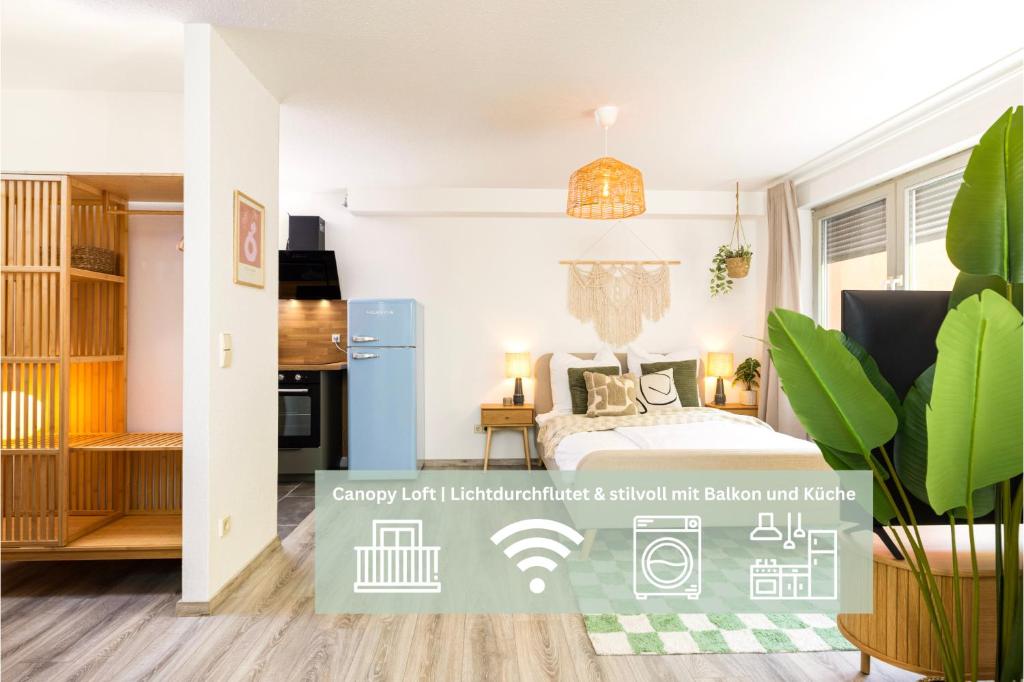 a small bedroom with a bed and a kitchen at StayTime - Canopy Loft in Dresden