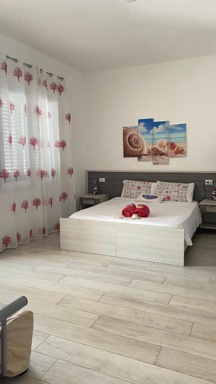 Letto o letti in una camera di Albachiara