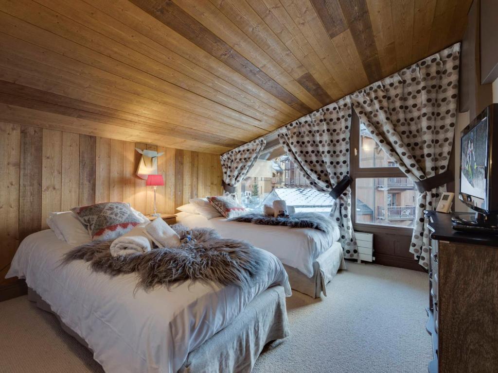 Posteľ alebo postele v izbe v ubytovaní Appartement spacieux, 4 chambres, 8 personnes, WiFi, Tignes le Lac - FR-1-641-15