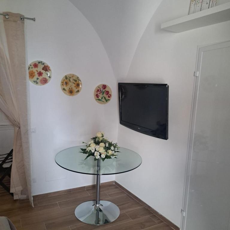 TV a/nebo společenská místnost v ubytování AL BELVEDERE