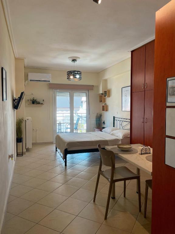 Kuchyň nebo kuchyňský kout v ubytování September Apartment of chalkida