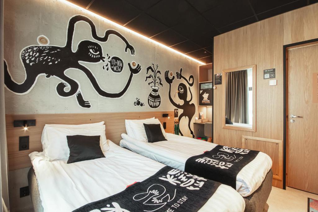Ένα ή περισσότερα κρεβάτια σε δωμάτιο στο Time Hotel, Time To Stay art & boutique
