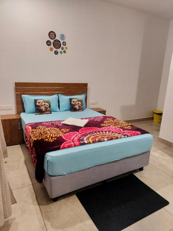 Postel nebo postele na pokoji v ubytování Asprin Homestay