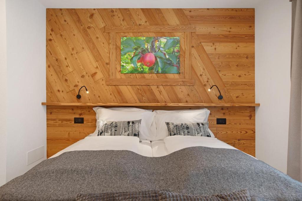 Postel nebo postele na pokoji v ubytování La Douce Pomme