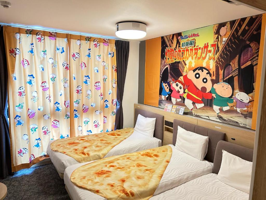 Postel nebo postele na pokoji v ubytování Henn na Resort & Spa Kansai Airport - former Henn na Hotel Kansai Airport