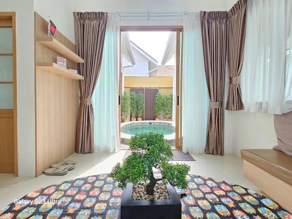 Un pat sau paturi într-o cameră la Japan Smile Resort