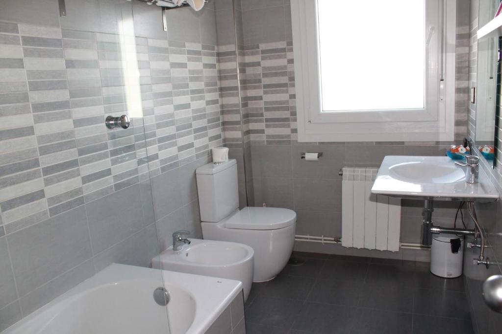 Kúpeľňa v ubytovaní Apartamentos Rodeiramar 2A