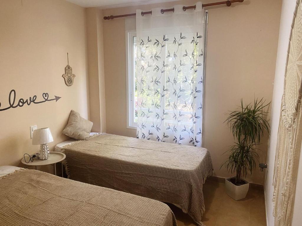 Postel nebo postele na pokoji v ubytování Appartment Maximar