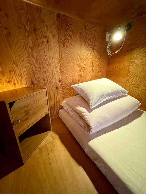 Voodi või voodid majutusasutuse Nomad Hostel Classic toas