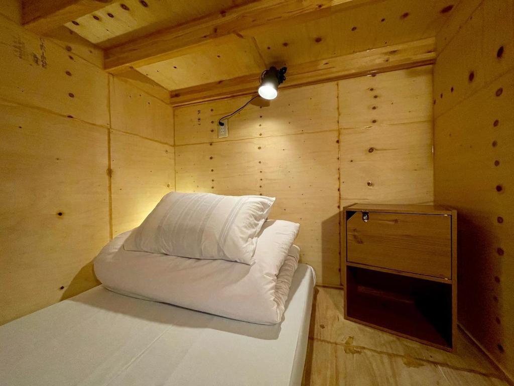 Voodi või voodid majutusasutuse Nomad Hostel Classic toas