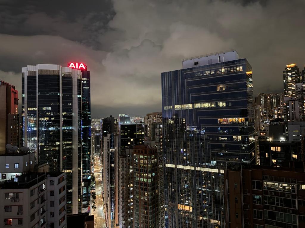 Nespecifikovaný výhled na destinaci Hongkong nebo výhled na město při pohledu z aparthotelu