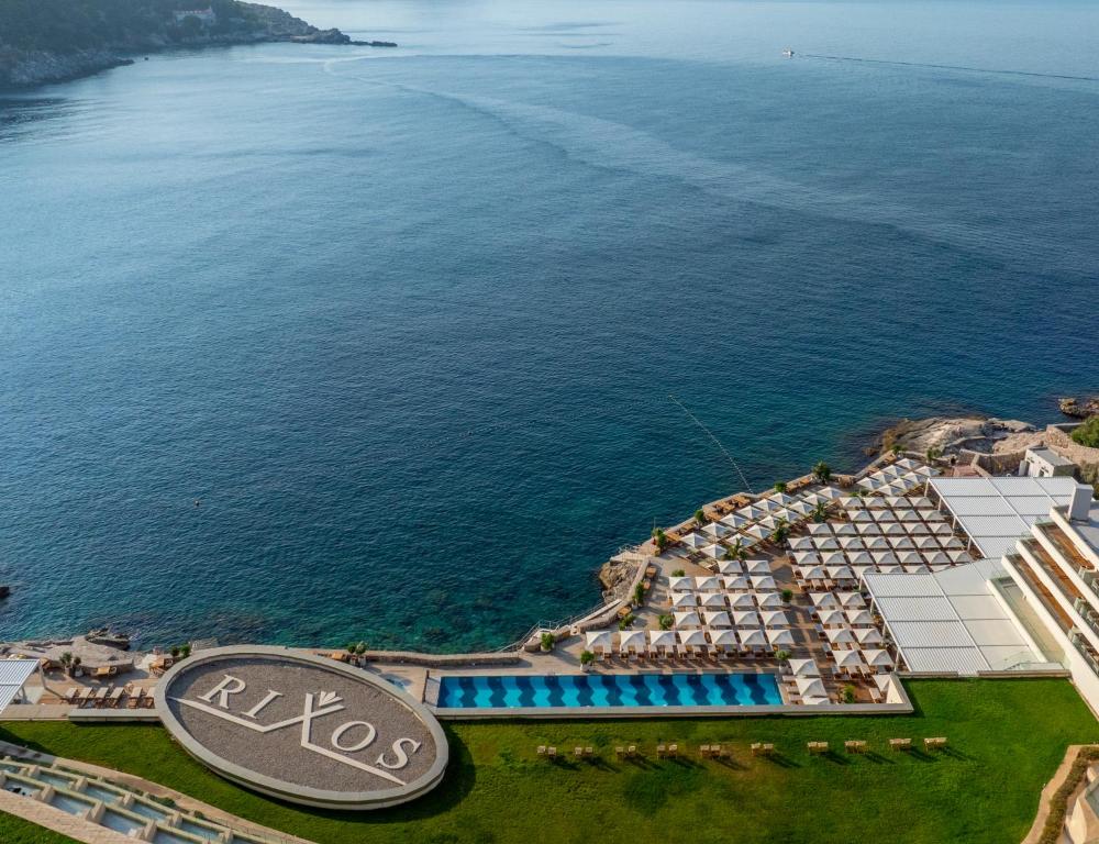 an aerial view of a resort next to the ocean at Rixos Premium Dubrovnik in Dubrovnik