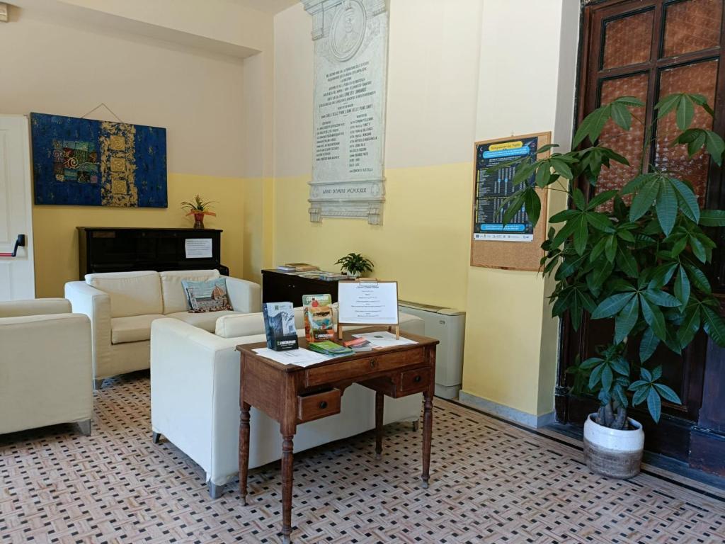 TV a/nebo společenská místnost v ubytování Sacro Cuore Hotel