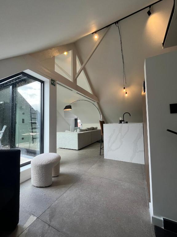 Posezení v ubytování Business Accommodation 'Loft' Intimate