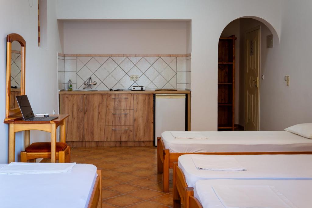 Postel nebo postele na pokoji v ubytování Apartments Noki