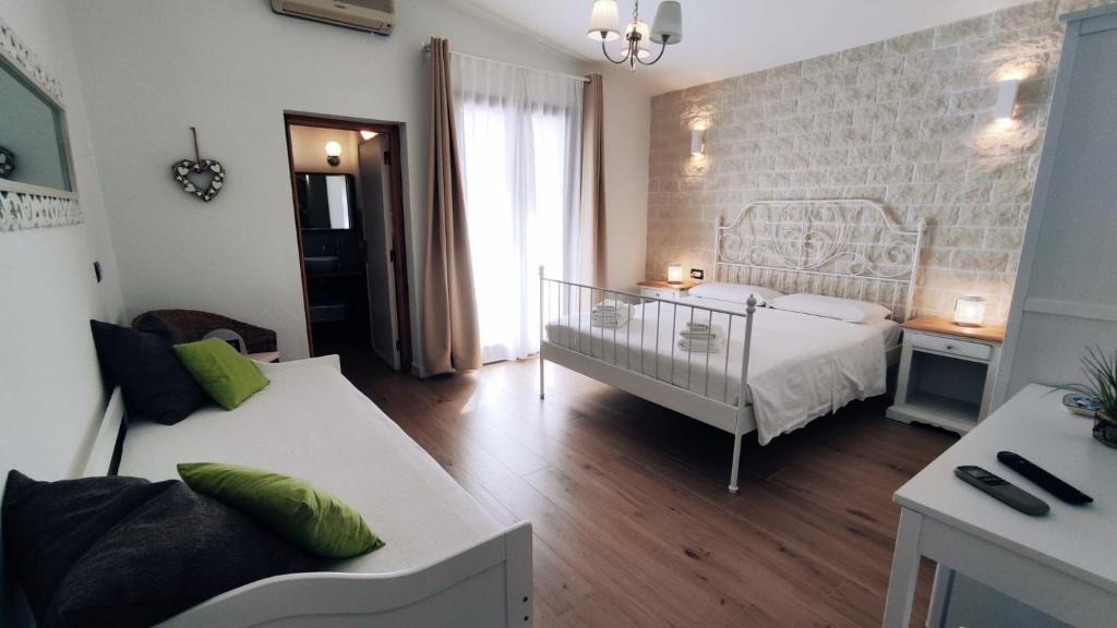 Postel nebo postele na pokoji v ubytování B&B Va' Pensiero