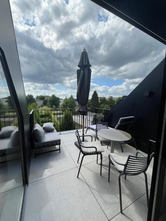 Balkón nebo terasa v ubytování Business Accommodation 'Loft' Intimate