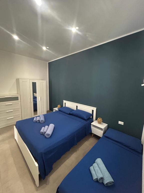 Ένα ή περισσότερα κρεβάτια σε δωμάτιο στο Sottovento Lampedusa