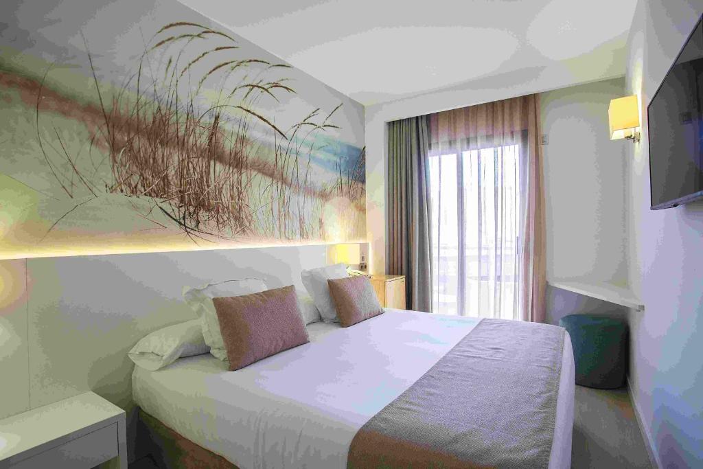 Posteľ alebo postele v izbe v ubytovaní BQ Can Picafort Hotel