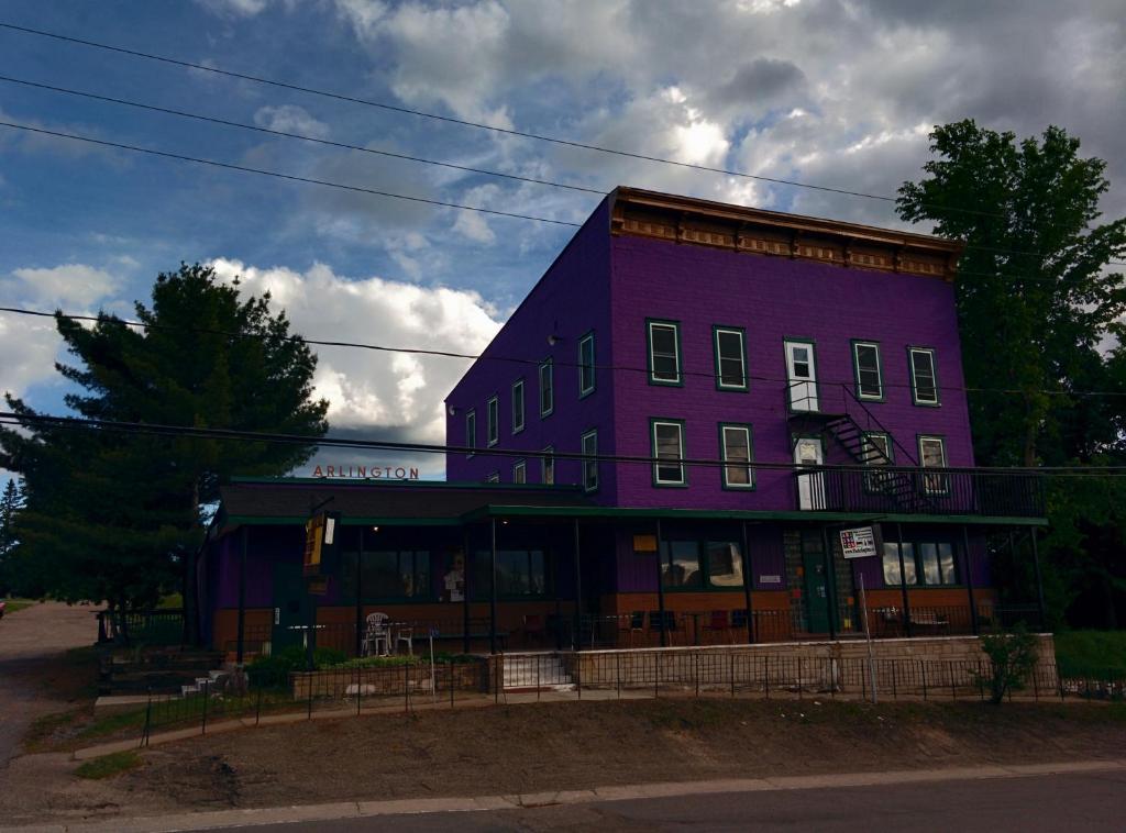 a purple building on the side of a street at The Arlington in Maynooth