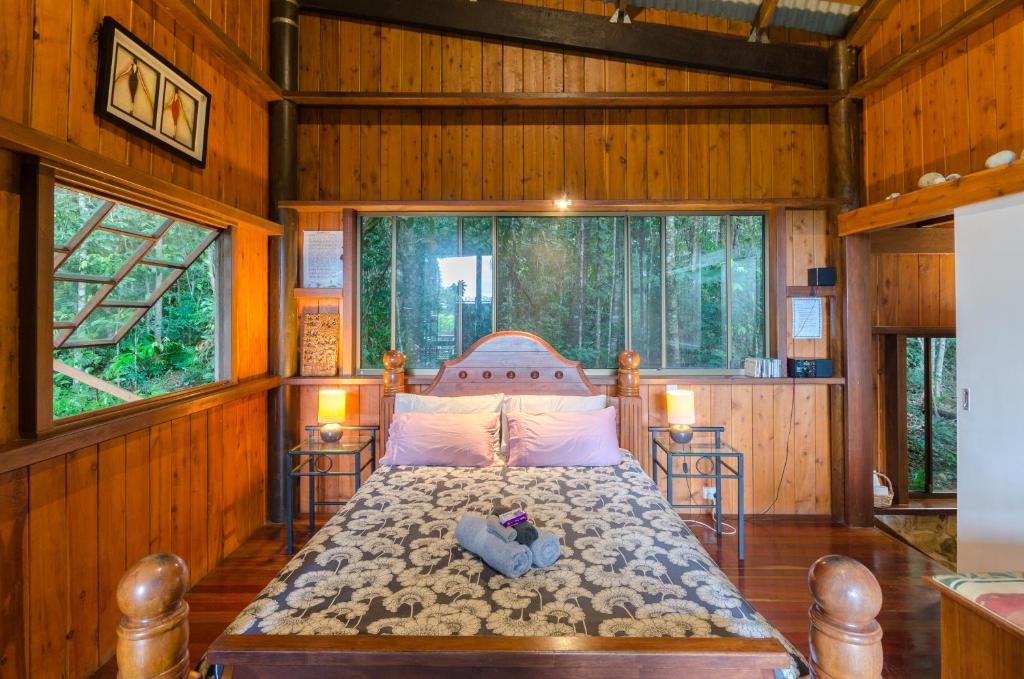 Postel nebo postele na pokoji v ubytování Epiphyte B & B