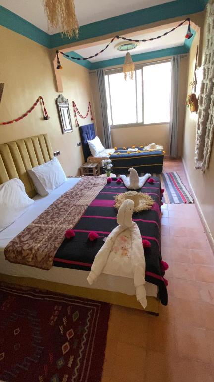 Letto o letti in una camera di Atlas Views