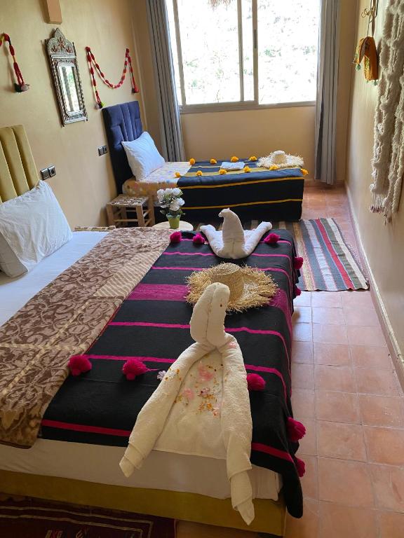 Letto o letti in una camera di Atlas Views