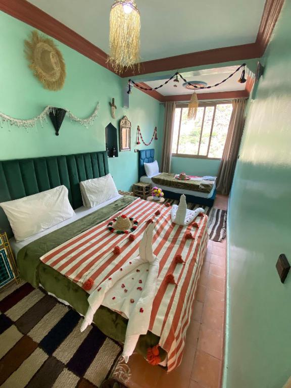 Letto o letti in una camera di Atlas Views