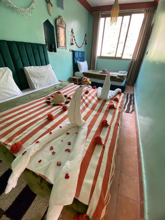Letto o letti in una camera di Atlas Views