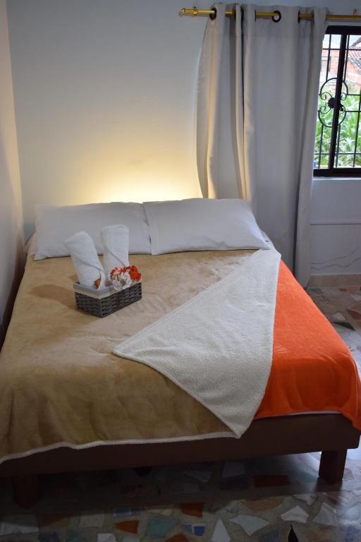 Postel nebo postele na pokoji v ubytování Hotel Casita de Belén